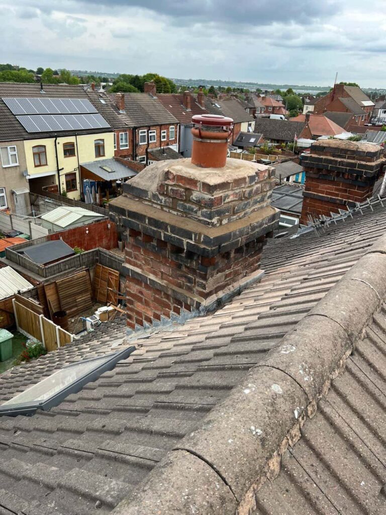 This is a photo taken from a roof which is being repaired by Nettleham Roofing Repairs, it shows a street of houses, and their roofs